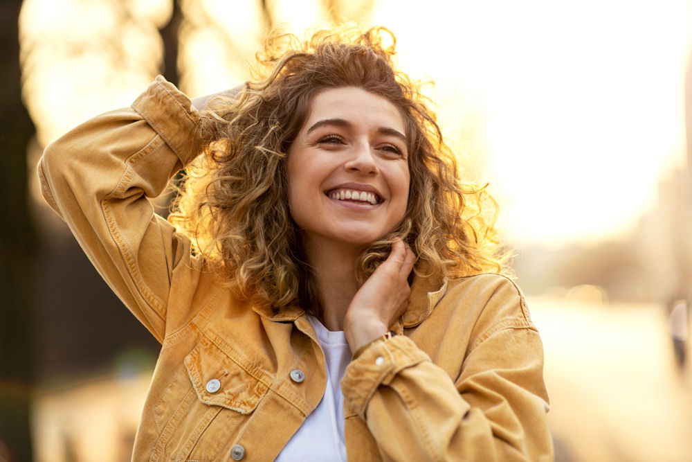 happy woman outside smiling